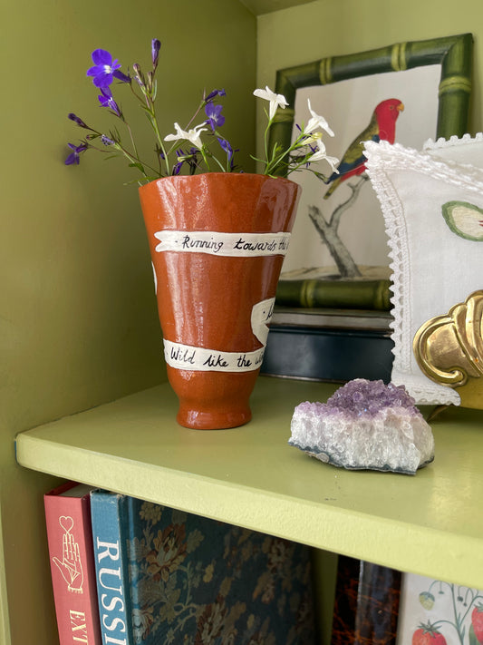Handmade ceramic ritual vessel displayed in a calm, thoughtfully styled interior